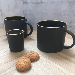 Gorgeous black and gold crockery